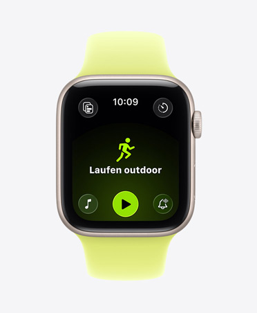 Apple Watch SE 3, Aluminiumgehäuse, Farbe Polarstern, geöffnetes Outdoor-Lauftraining, Apple Music Steuerelemente für die Wiedergabe unten, Sportarmband, Farbe Neongelb