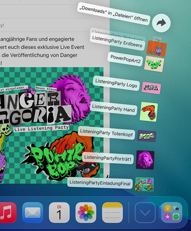 Nahaufnahme des Docks am unteren Bildschirmrand mit einer Reihe von Dateien, die nach oben aus dem Dock herausgefächert werden
