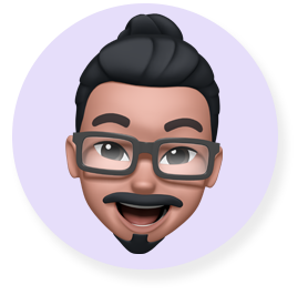 Memoji sorridente di un uomo con la barba e gli occhiali