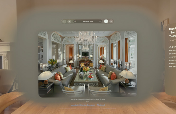 Safari web page featuring inline spatial scene of living room with long deep hallways in background