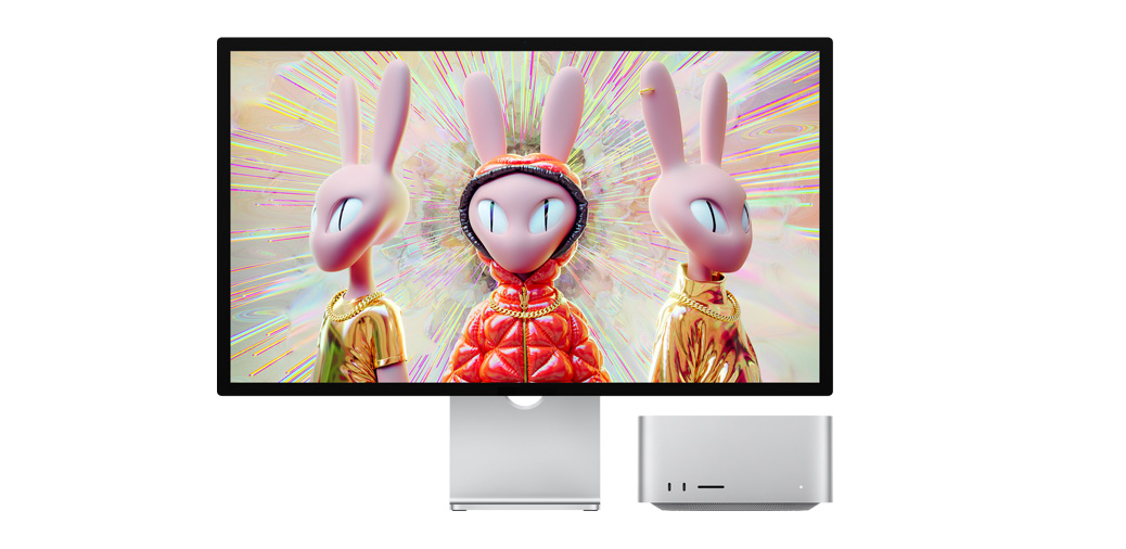 Mac Studio alongside Studio Display showing a 3D image of humanoid rabbit characters.